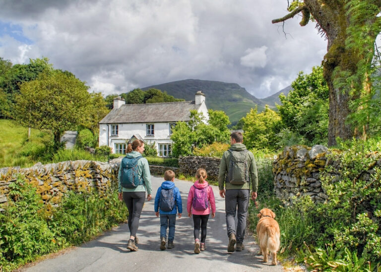 family walking to a cottage in Grasmere