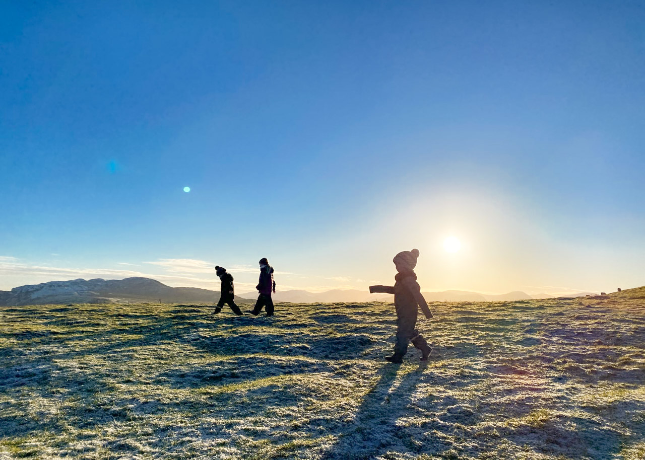 Kids walking in the Lake District on a sunny winter's day