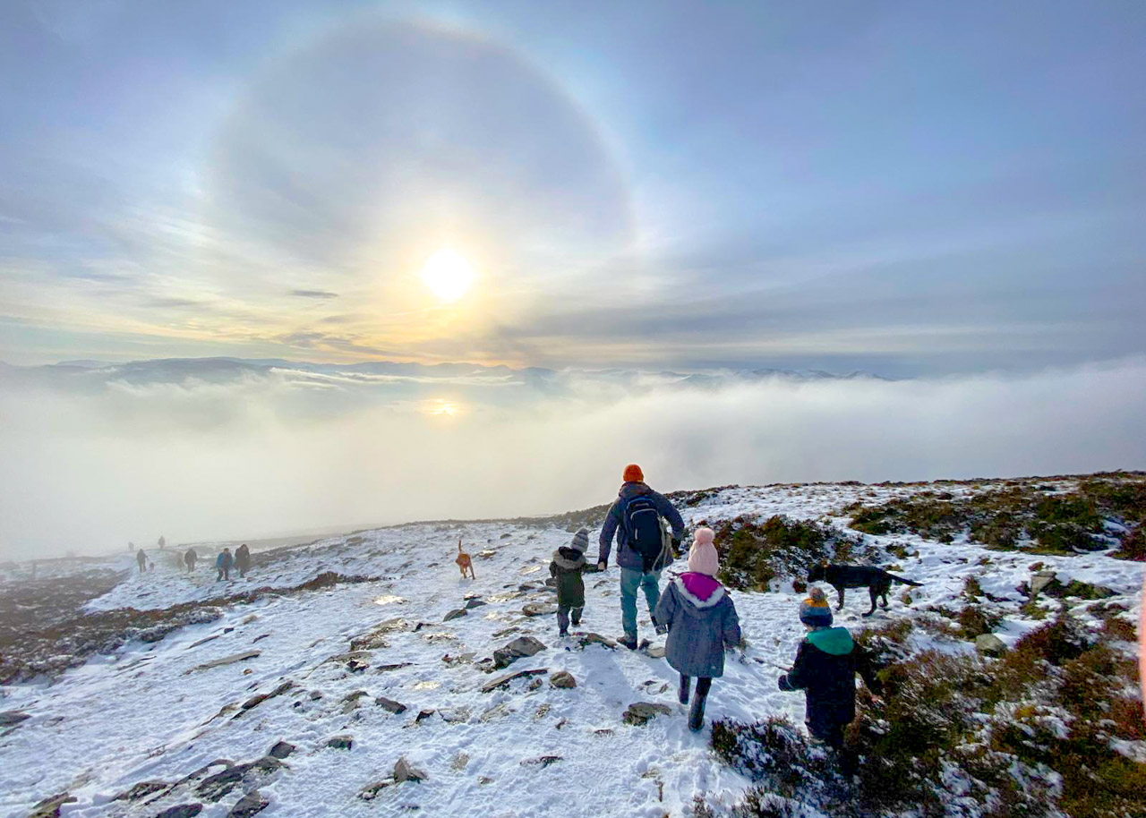Lake District family walking in winter on Skiddaw.